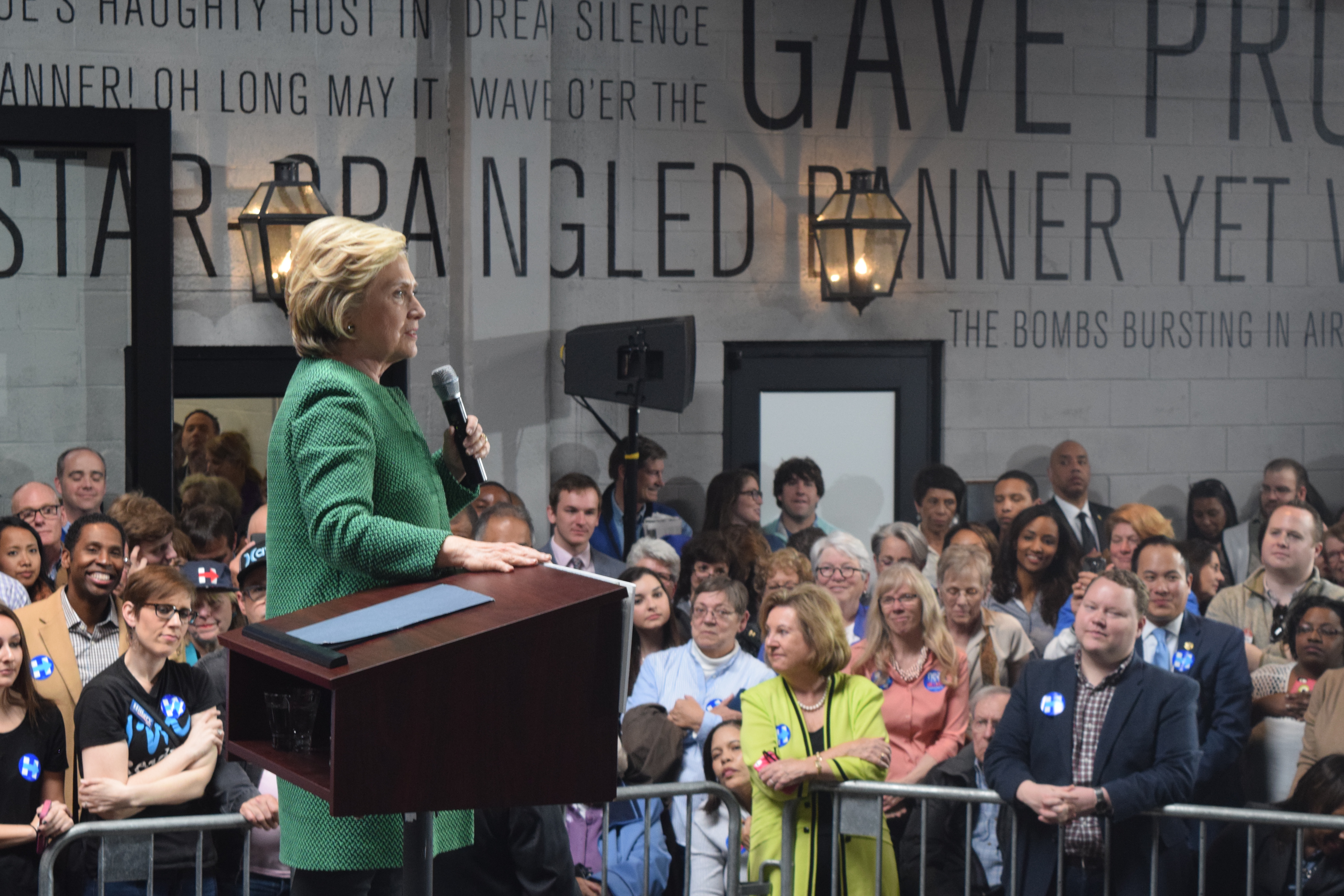 Hillary Clinton addresses a crowd of supporters in Baltimore Sunday. (Capital News Service photo by Alexandra Pamias)