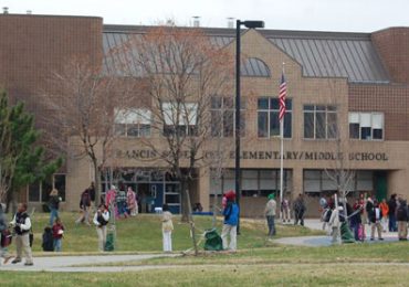 Students congregate after dismissal from Francis Scott Key Elementary/Middle School. Locust Point residents are trying to inspire more neighborhood parents to enroll their children in the school. By Kate Yoon/Capital News Service
