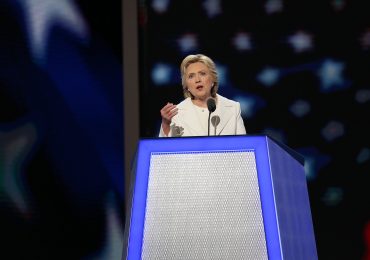 Hillary Clinton and Bill Clinton celebrate as balloons drop on the Democratic National Convention stage and floor after Hillary Clinton's acceptance speech Thursday. Capital News Service photo by Hannah Klarner.