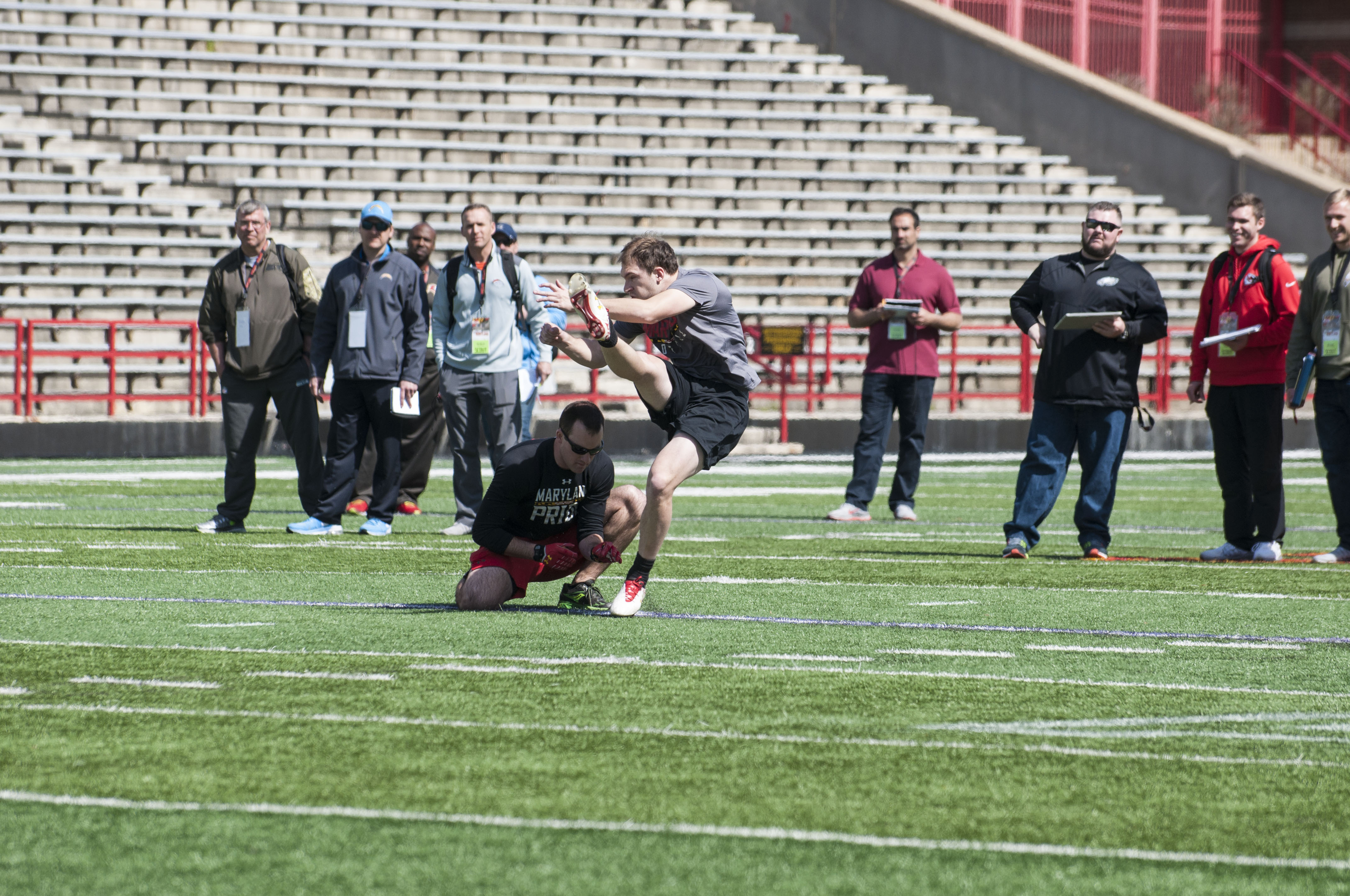 Brad Craddock, place kicker for the Maryland Terrapins, practices kicking field goals for NFL scouts at Maryland Football Pro Day in College Park, Md. at Capital One Field at Maryland Stadium.(Photo courtesy of Rebecca Rainey)