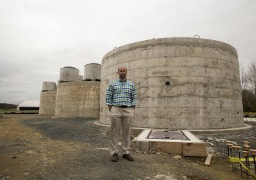 Chickens gather in one of the four chicken houses on Millennium Farms in Pocomoke City, Maryland. The farm currently has about 80,000 chickens, according to owner Jason Lambertson. Capital News Service Photo by James Levin.