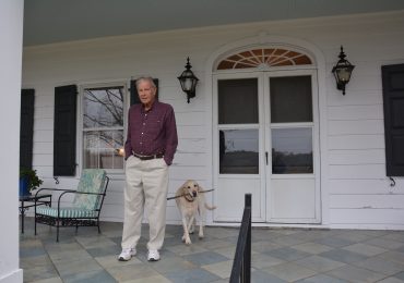 Gov. Harry Hughes with his dog Miller