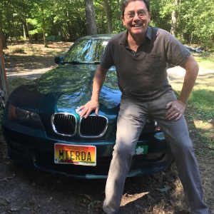 John T. Mitchell poses with his car’s “MIERDA” license plate, which the Maryland Motor Vehicle Administration recalled in 2011. The plate is the subject of a case in the Maryland Court of Appeals. Sept. 14, 2016. (Courtesy photo from John T. Mitchell.)
