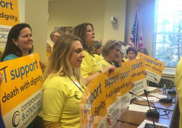 Kaili Van Waveren, 32 from Frederick, and other volunteers with the nonprofit Compassion & Choices attend a press conference in Annapolis on January 28, 2016 regarding Maryland end of life legislation. (Capital News Service photo by Lexie Schapitl)
