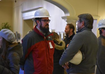 Solar workers Tim Gillen, left, and Harry Benson arrive in Annapolis on Thursday, February 11, 2016, to show support for pending legislation that would require electric companies to reduce the time it takes to connect customers’ energy panels to their power grids. (Capital News Service photo by Leo Traub)