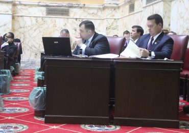 Minority Leader J.B. Jennings, R-Baltimore County, (left) and Minority Whip Stephen S. Hershey Jr., R-Caroline, (right) flip through notes detailing the agenda for the Senate on January 21, 2016, in Annapolis, Maryland. (Capital News Service photo by Josh Magness)