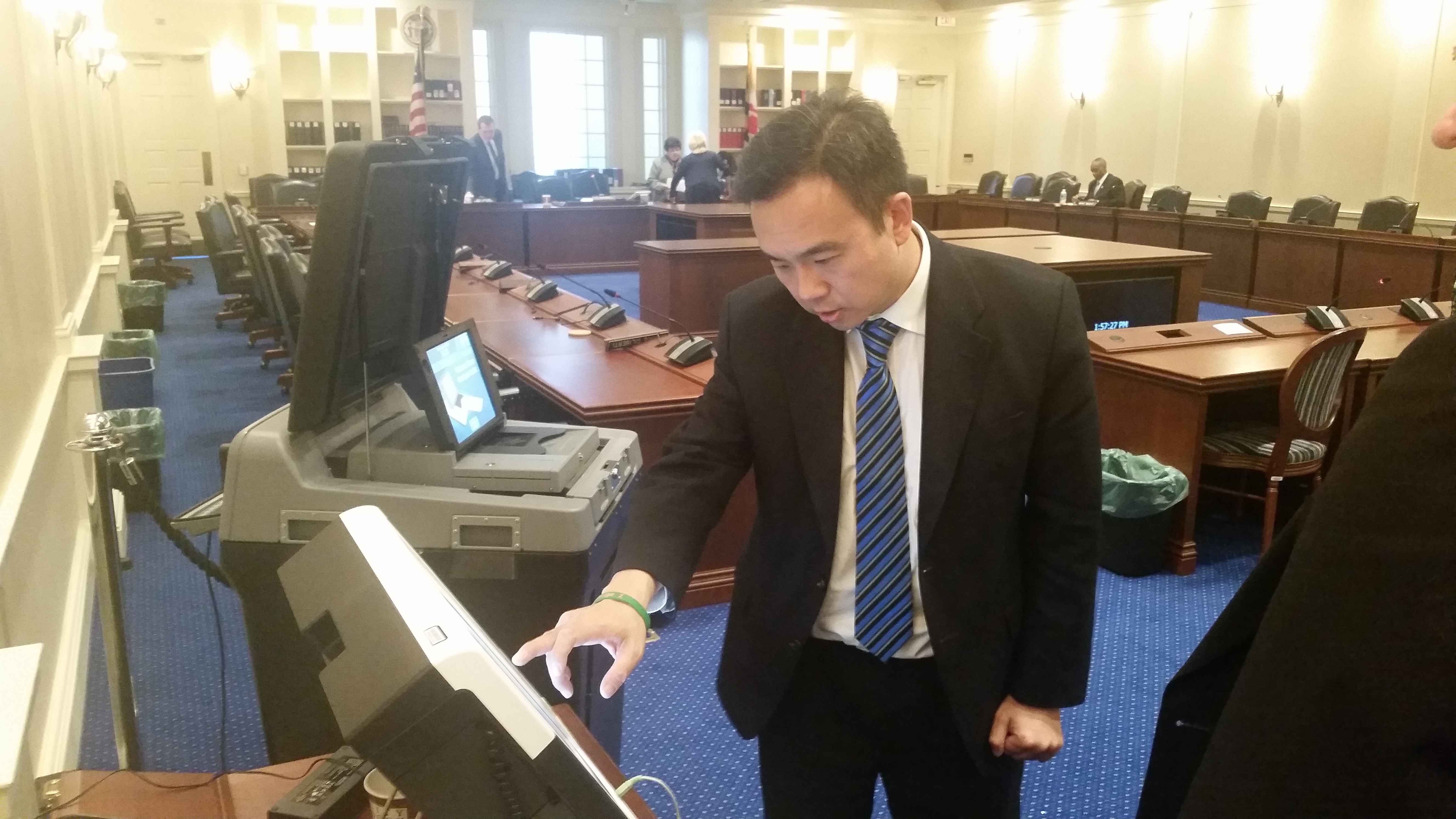Most voters in Maryland will fill out a paper ballot with a pen to vote in the primary elections in April. Some disabled voters will fill their ballots out on touch-screen machines like the one Delegate Mark Chang, D-Anne Arundel, tested out in Annapolis on Friday, January 29, 2016. (Capital News Service photo by Rachel Bluth.)