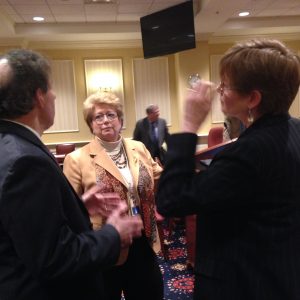 Maryland Delegate Kathleen Dumais, D-Montgomery (center), talks to the Commission on Child Custody Decision-Making Chair Cynthia Callahan (right), and state Senator Jamie Raskin, D-Montgomery (left), after the Commission made recommendations to the Senate's Judicial Proceedings Committee about the process for child custody cases on Thursday, January 29, 2015. (Capital News Service photo by Grace Toohey).
