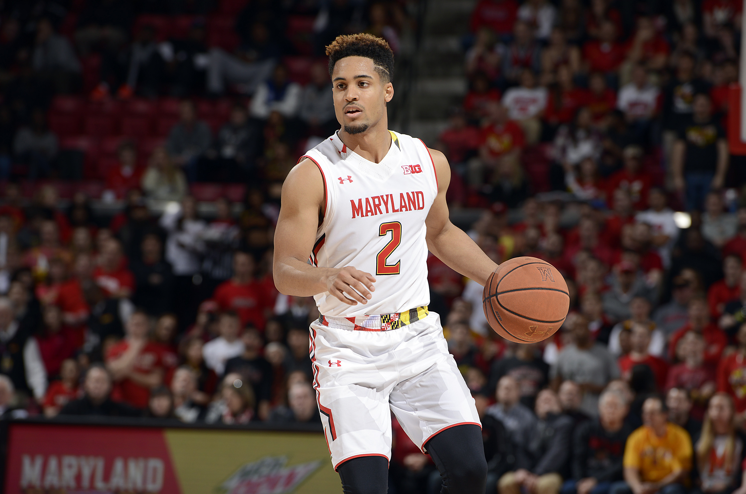 Melo Trimble dribbles up the court. (File photo courtesy of Maryland Athletics.)