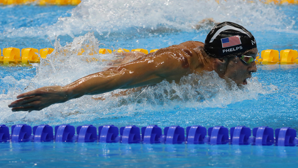 Olympic champion Michael Phelps of United States swimming the Men's 200m butterfly at Rio 2016 Olympic Games. Leonard Zhukovsky / Shutterstock.com