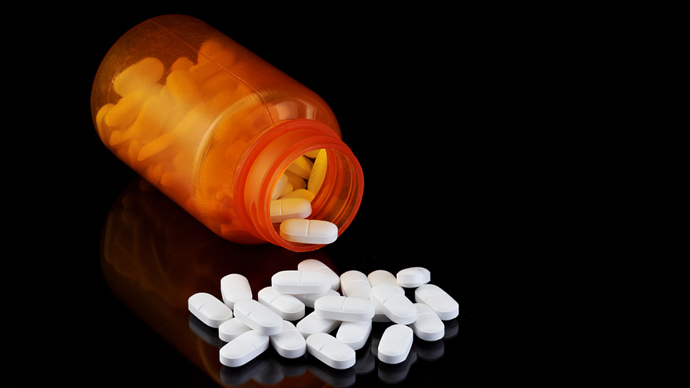 A bottle of prescription painkillers. The opioid epidemic continues to swell, taking an average of 78 American lives each day, according to the U.S. Department of Health and Human Services. Photo courtesy Paul Orr/Shutterstock.com.