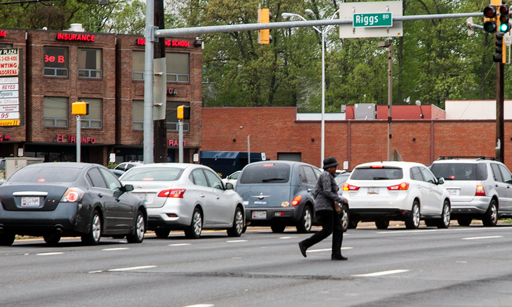 About half the pedestrian fatalities on University Boulevard in Langley Park since 2009 occurred near the busy intersection of University and Riggs Road. (Capital News Service photo by Rebecca Rainey)