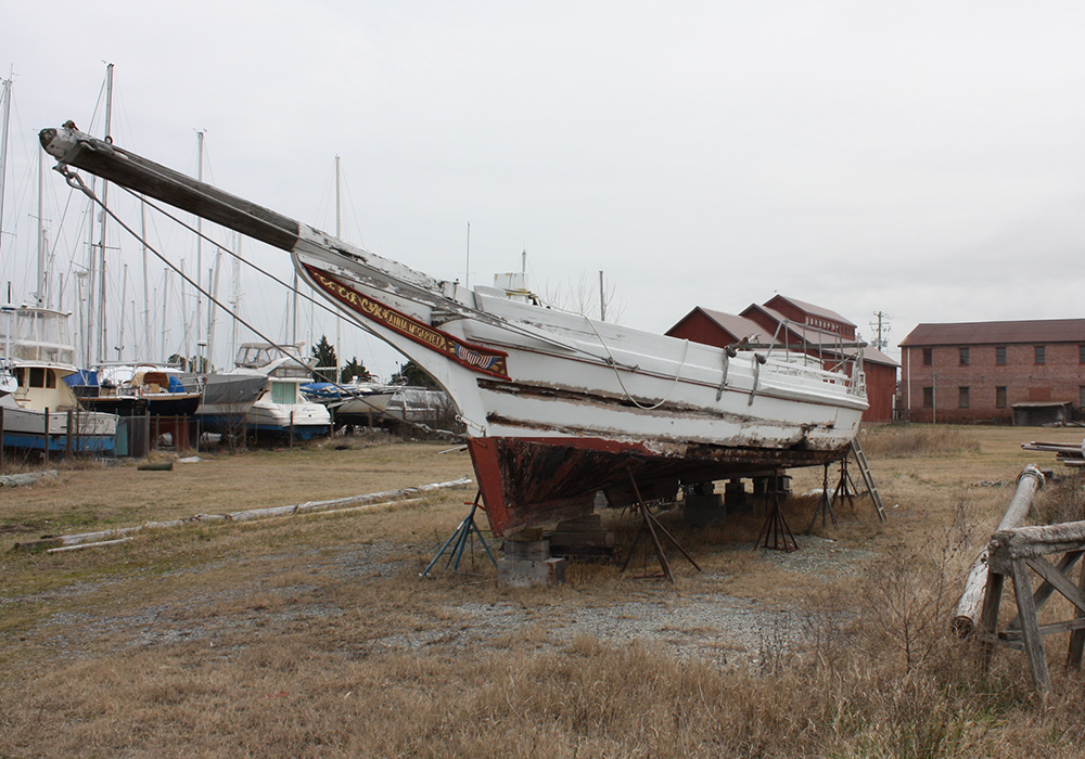 An old boat awaits its fate in Cambridge, Md. According to Robert T. Brown, president of the Maryland Waterman's Association, the average age of a waterman is somewhere in the 60s. (Photo by J.F. Meils/Capital News Service)