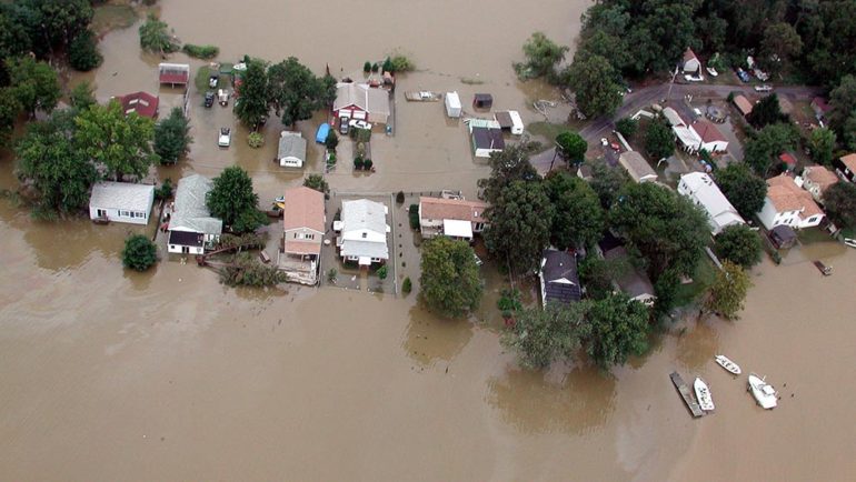 Bowleys Quarters, Md., September 19, 2003 -- Bayside homes in Bowleys Quarters are swamped the day after Hurricane Isabel hit Maryland. The six-foot storm surge generated by the hurricane caused extensive damage in this east Baltimore County community. Photo by Crystal Payton/FEMA News.