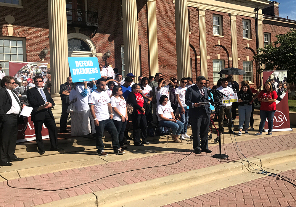 LANGLEY PARK, Md. – Executive Director of CASA Gustavo Torres announces the organization’s lawsuit against the Trump Administration, backed by DACA dreamers, in front of CASA’s Multicultural Center on Oct. 5, 2017 (Jess Feldman/Capital News Service).