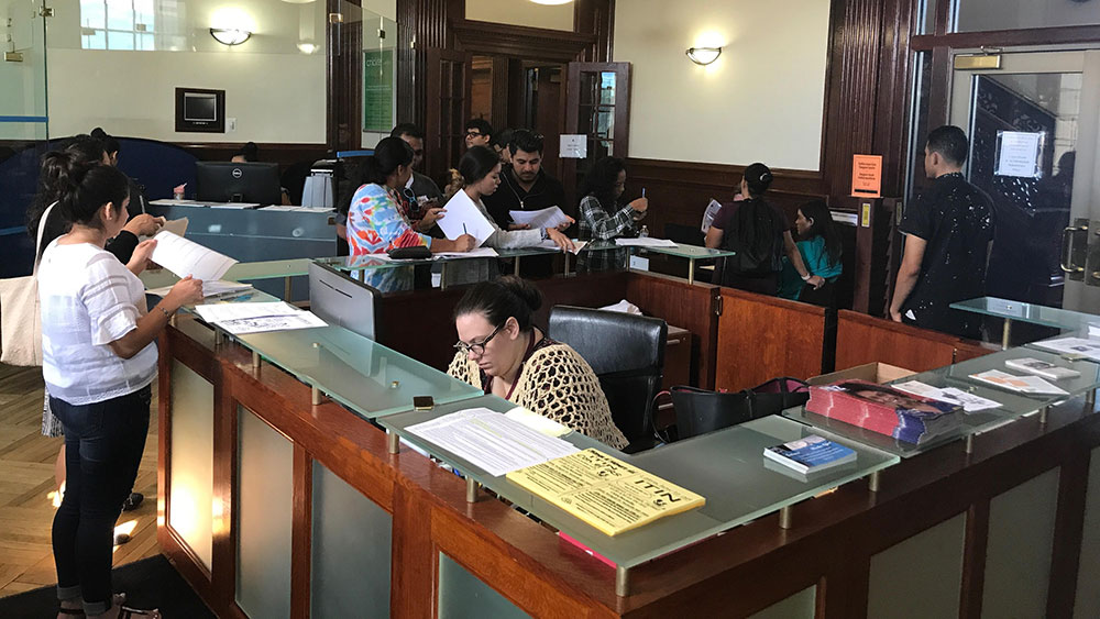 1. Immigrants at CASA in Langley Park, Maryland, on Saturday, September 30, 2017, to complete their DACA renewal applications. (Chris Miller/ Capital News Service)