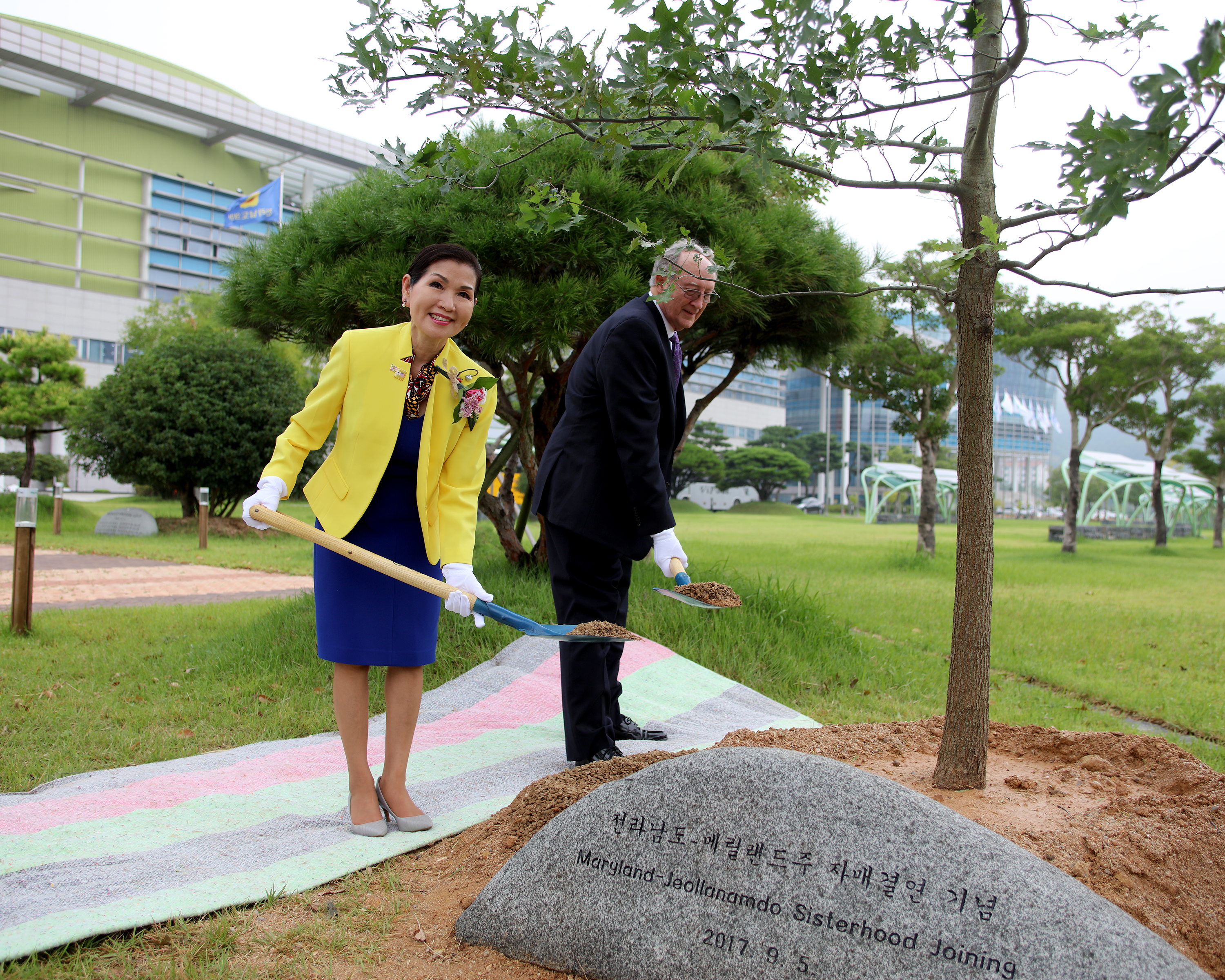 Maryland Secretary of State John Wobensmith and first lady Yumi Hogan plant a tree in Jeollanam-do province to dedicate it becoming a sister state with Maryland. Jeollanam-do province is the second sister state relationship Maryland has with South Korea, and is also where Hogan was born. Photo courtesy of the Maryland Governor’s Press Office.