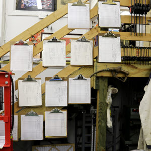 CROWNSVILLE, Md. -- Ted meticulously records every change he makes to each of his 12 cars on these designated clipboards, which he described on Tuesday, Sept. 21, 2017 (Jess Feldman/Capital News Service).