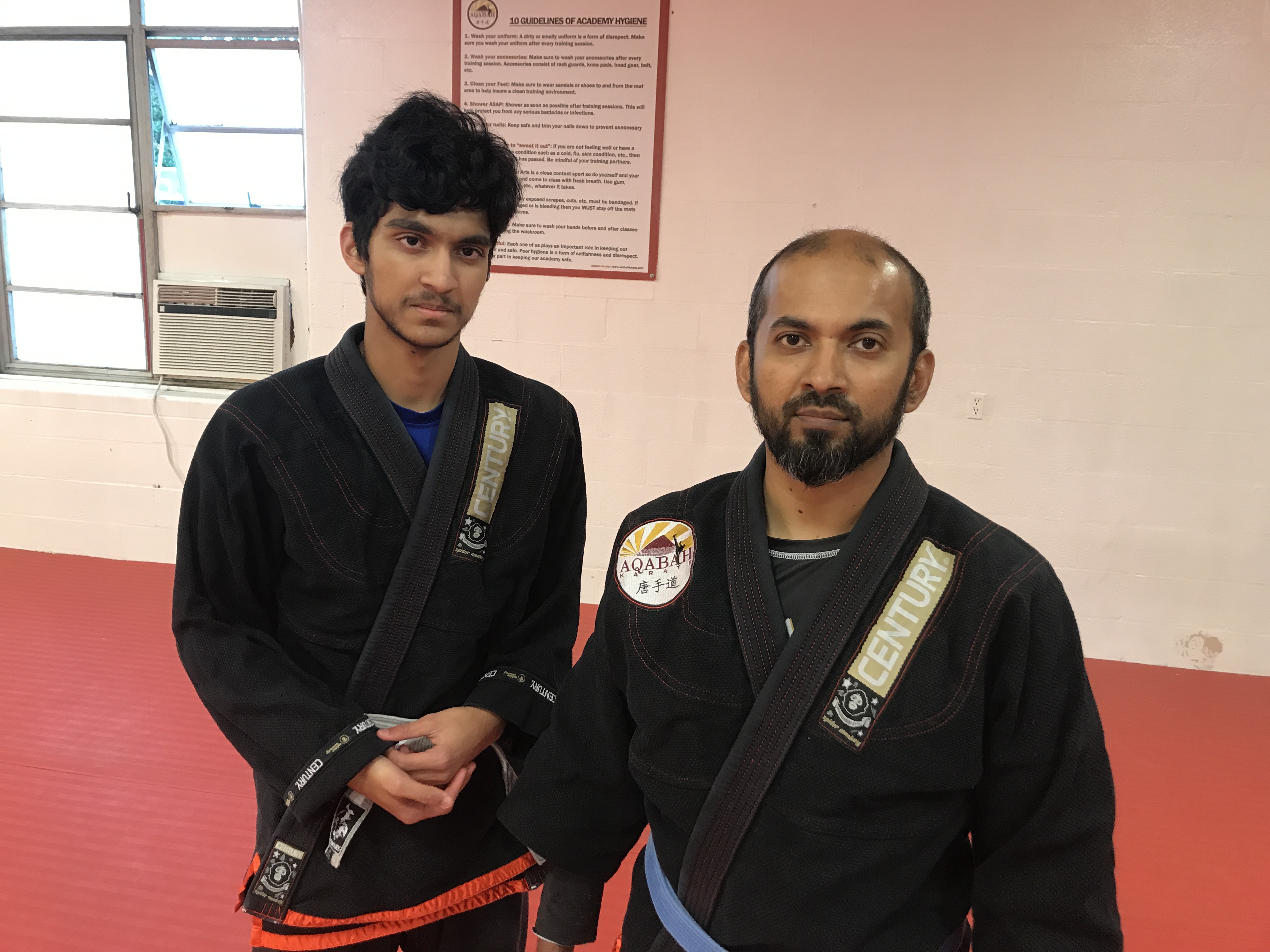 Muhib Rahman and his son Talha Muhib at Aqabah Karate on Thursday, October 26, 2017. Rahman is an instructor at Aqabah Karate in College Park and Talha is one of his students. (Chris Miller/Capital News Service)