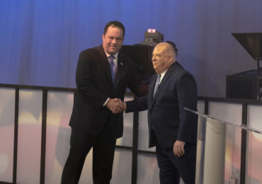 Democratic challenger Ben Jealous shakes hands with incumbent Republican Gov. Larry Hogan at the lone 2018 Maryland gubernatorial debate on Monday, Sept. 24, 2018, in Owings Mills, Maryland.