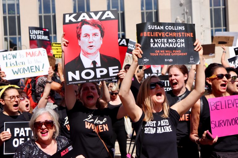 WASHINGTON - Protesters urged Congressman Collins to vote no on Kavanaugh (Albane Guichard/Capital News Service)