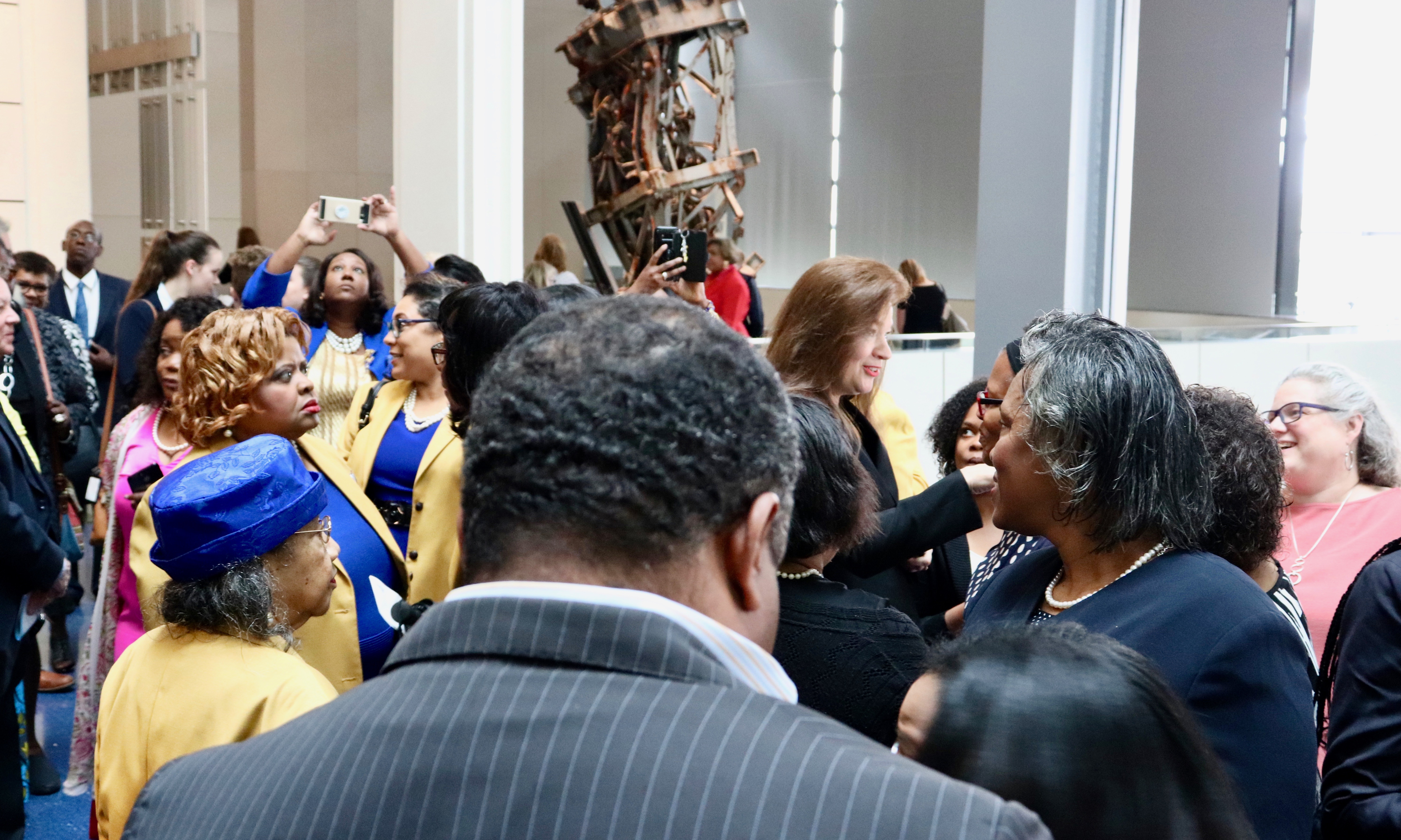 WASHINGTON - After the unveiling, Alice Allison Dunnigan&#039;s family members and sorority sisters met with sculptor Amanda Matthews (Albane Guichard/Capital News Service)