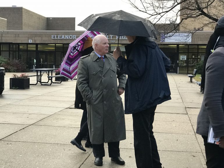 Sen. Ben Cardin speaks to voters at the polls at Eleanor Roosevelt High School. (Jared Goldstein/Capital News Service)