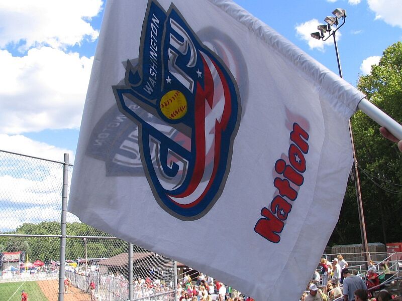 A flag featuring the Washington Glory's logo flies at one of the team's home games. The Washington Glory were a professional softball team from 2007-2009. (Photo credit: Paul Wilson)