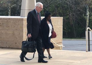 Former Maryland Delegate Tawanna Gaines, D-Prince George's, walks with her attorney, William Brennan Jr., toward the U.S. District Court in Greenbelt, Maryland, on Oct. 17, 2019, to appear for her arraignment on a federal wire fraud charge. Capital News Service photo by Elliott Davis.