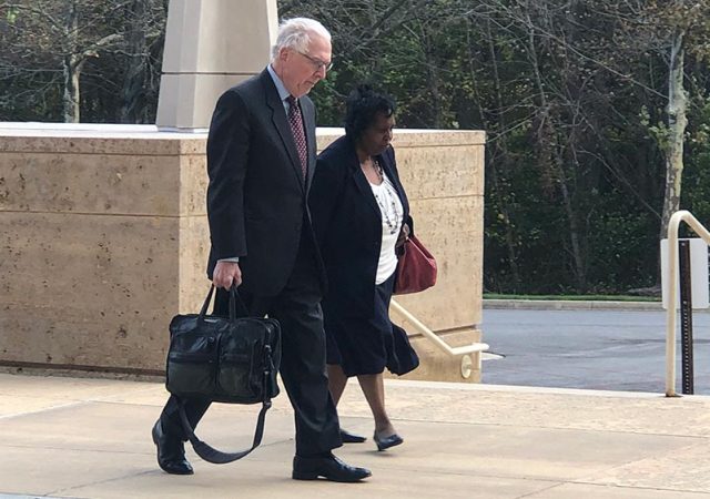 Former Maryland Delegate Tawanna Gaines, D-Prince George's, walks with her attorney, William Brennan Jr., toward the U.S. District Court in Greenbelt, Maryland, on Oct. 17, 2019, to appear for her arraignment on a federal wire fraud charge. Capital News Service photo by Elliott Davis.