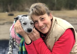 Deborah Darlene Olsen has been living out of her car in Fayetteville with her dog, Ava Bear. Olsen has an eye out constantly for her personal safety. (Photo by Brooke Tomlin | The Razorback Reporter)