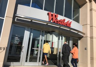 Local businesses prepare for the holiday season in the midst of a pandemic surge.