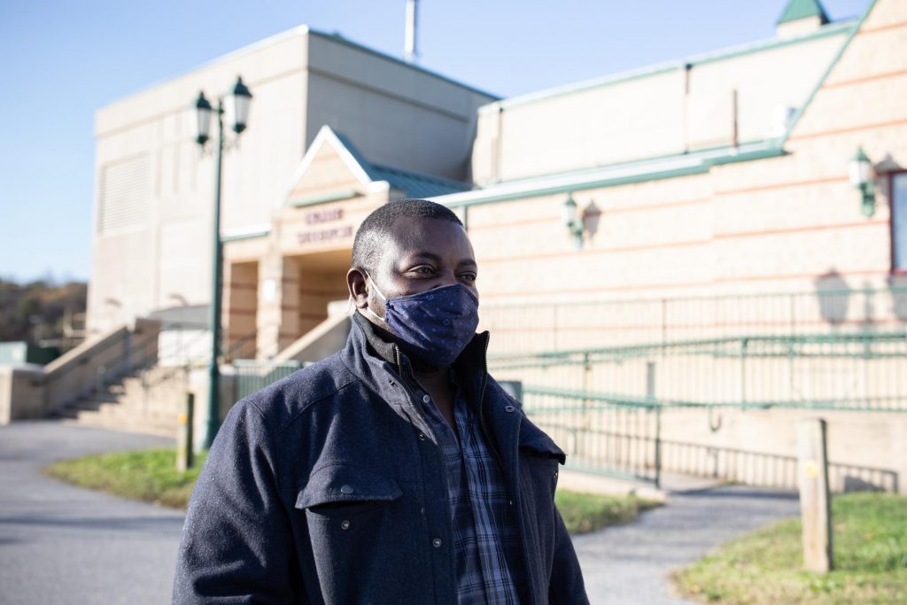 Yaw Menyah, 48, outside The Show Place Arena, said covid-19 was a key factor in his vote for president. (Photo by Brittany N. Gaddy)