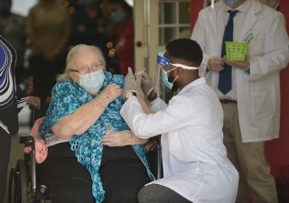 A COVID-19 vaccine is administered to a nursing home resident December 23, 2020. (Maryland GovPics)