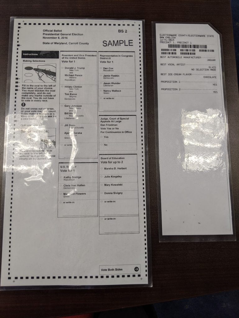 Side-by-side size comparison of a Maryland hand-marked ballot and one produced by a ballot marking device. Photo: Scott Tiffin/Chief of Staff to Senator Clarence Lam, D-Baltimore and Howard counties.