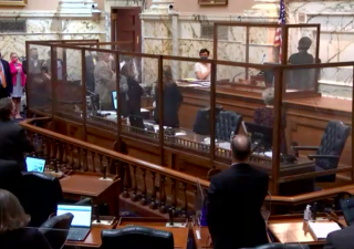 Members of the Maryland House of Delegates recite the Pledge of Allegiance before commencing their March 30 floor session, in which two unemployment insurance bills passed (Screenshot by Jack Hogan / Capital News Service).