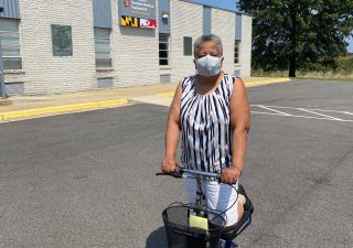 Janice Joyner in front of the Durable Medical Equipment Re-Use Headquarters in Cheltenham, Maryland, on August 27, 2021. Photo courtesy of Program Director Ian Edwards