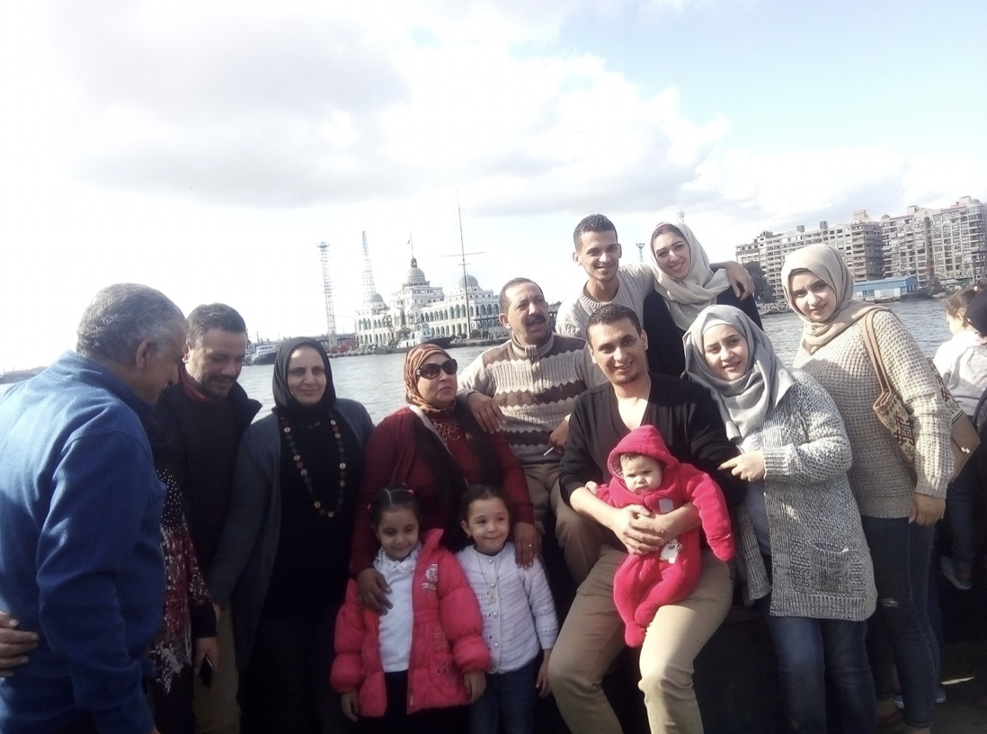 Egyptian journalist Khaled Ghoneim (back row, fourth from right) and his family in Port Said, Egypt, on Dec. 6, 2019.