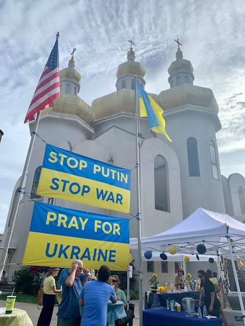 Large banners outside St. Michael Ukrainian Catholic Church protest Russia’s invasion of Ukraine at the 45th annual Baltimore Ukrainian Festival. (Sapna Bansil/Capital News Service)