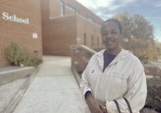 Pam Hill of Mount Rainier voted early on Tuesday, and urged others to get off the couch to vote, too. "You'll feel good afterwards," she said. (Lisa Woelfl/For Capital News Service)
