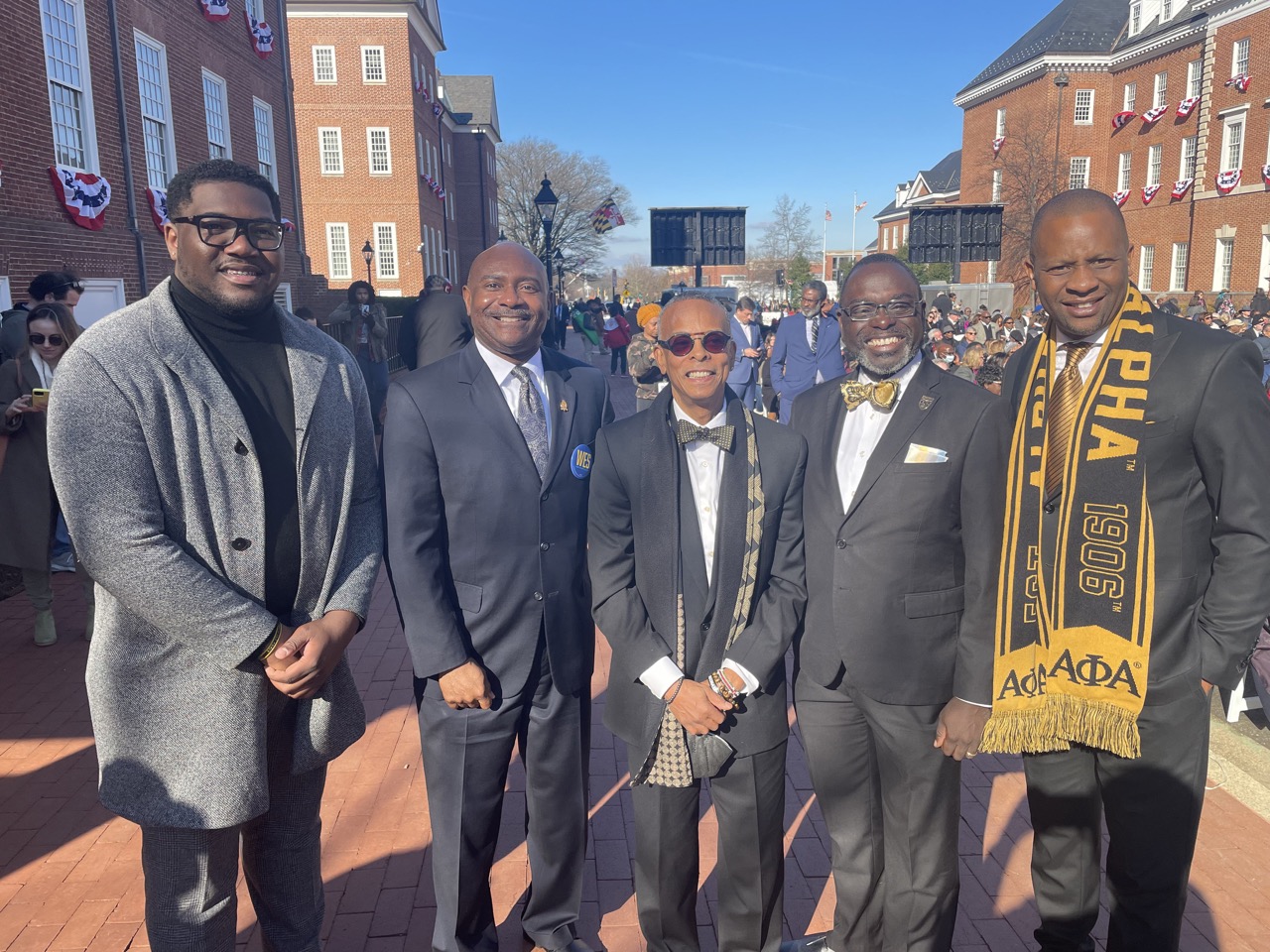 A multi-generational delegation of Alpha Phi Alpha fraternity members arriving to support new Maryland Governor and Alpha Wes Moore. From left to right: Jordan McKiinney, 19, Dr. Ralph Johnson, 63, Larry Davis, 63, Anton Deville, and Lucien Metellus, 47.