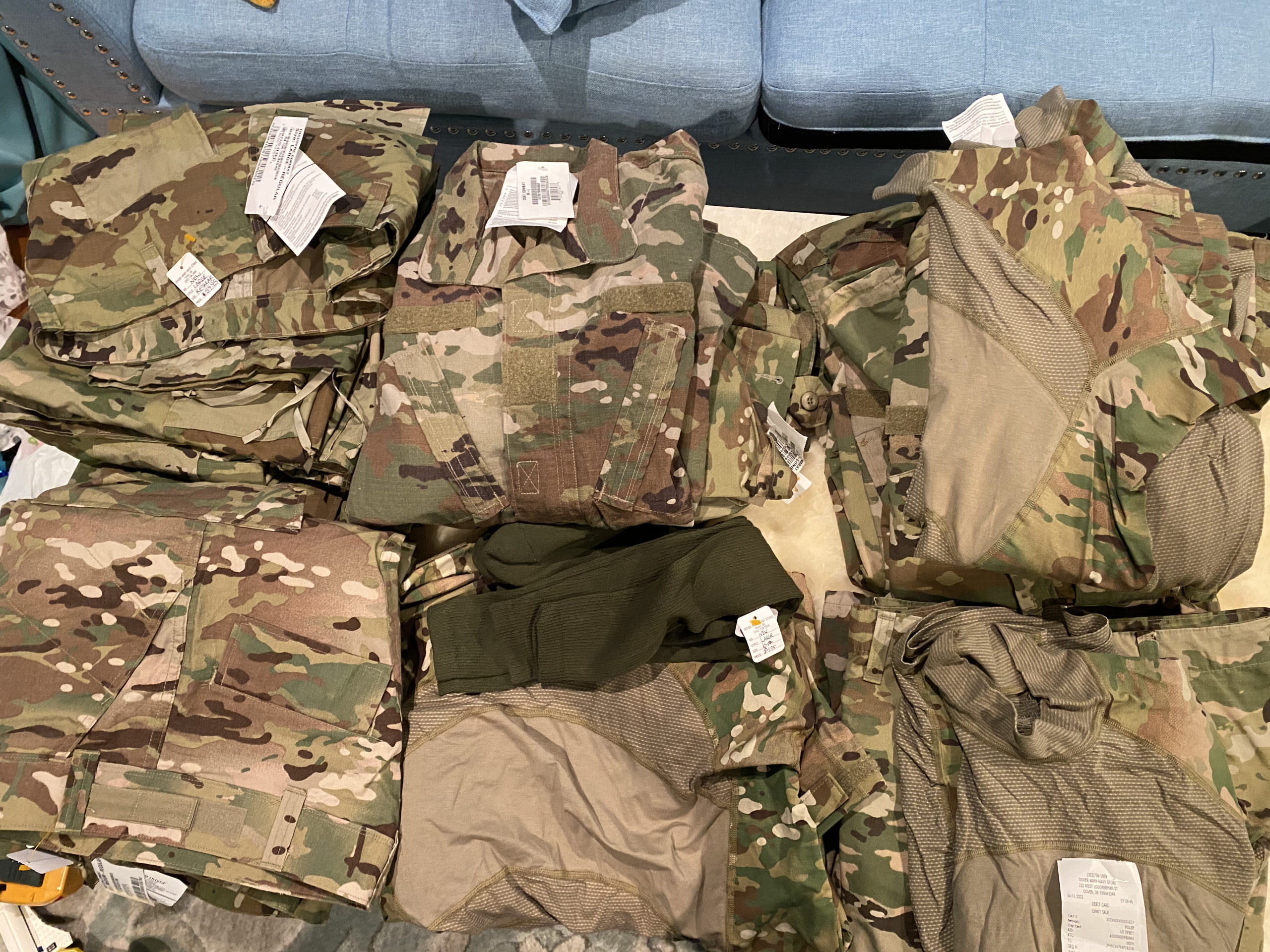 Folded Ukrainian military uniforms.