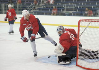 Capitals 2022 third-round pick Alexander Suzdalev attempts a breakaway shot on 2018 fourth-round pick Mitchell Gibson at rookie camp Sunday, Sept. 17, 2023. (Capital News Service/Tommy Tucker)
