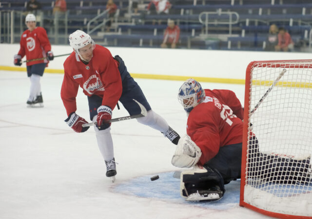 Capitals 2022 third-round pick Alexander Suzdalev attempts a breakaway shot on 2018 fourth-round pick Mitchell Gibson at rookie camp Sunday, Sept. 17, 2023. (Capital News Service/Tommy Tucker)