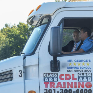 Governor Moore rides with Prince George's County Community College commercial driving school student Carlos Sanchez Wednesday Oct. 11, 2023. (Capital News Service/Tommy Tucker)