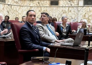 Sen. Will Smith, D-Montgomery, (left) sits next to Sen. Guy Guzzone, D-Howard, while the Maryland Senate is in session on Jan. 18, 2024. (Sapna Bansil/Capital News Service)