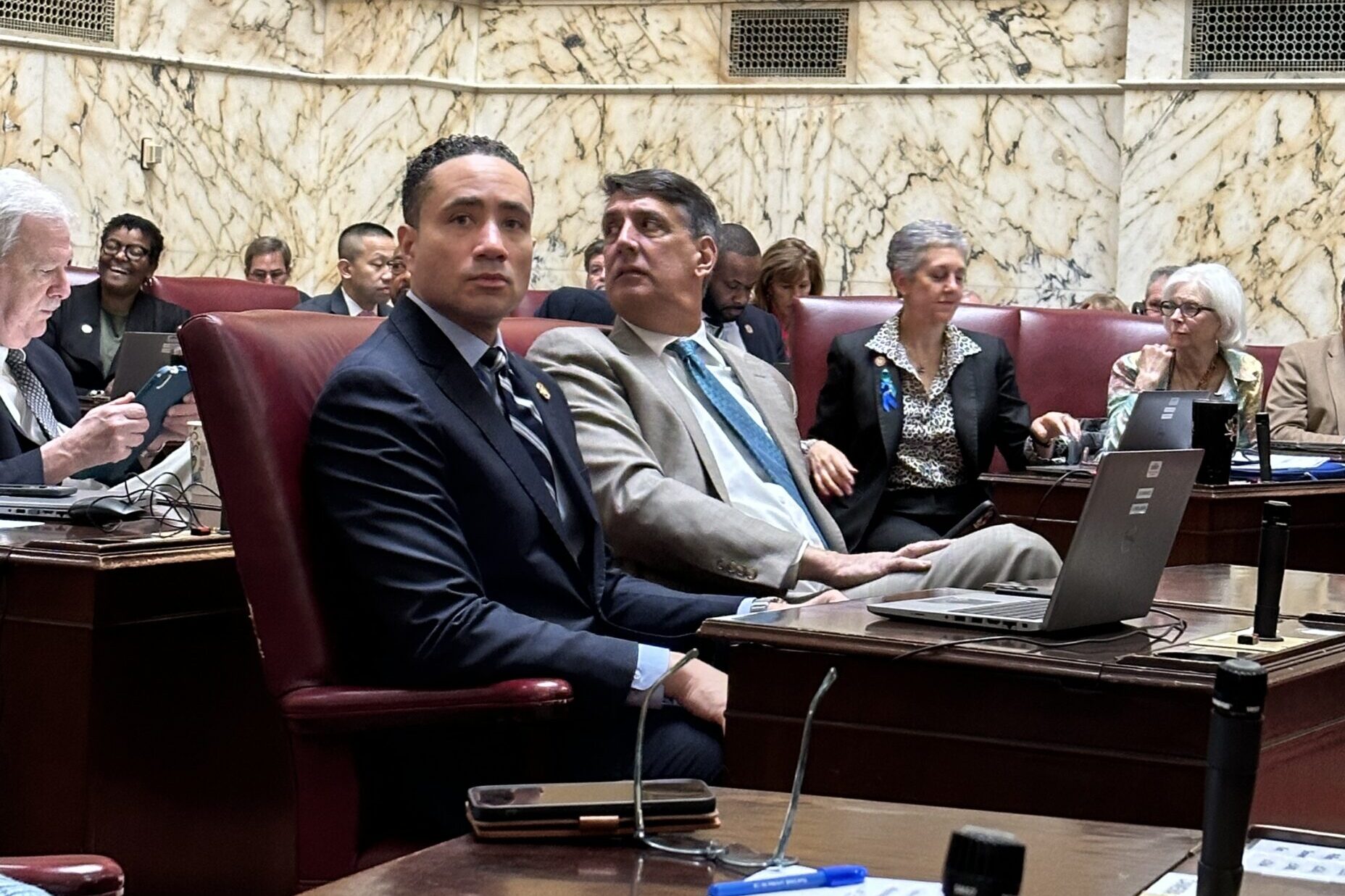 Sen. Will Smith, D-Montgomery, (left) sits next to Sen. Guy Guzzone, D-Howard, while the Maryland Senate is in session on Jan. 18, 2024. (Sapna Bansil/Capital News Service)