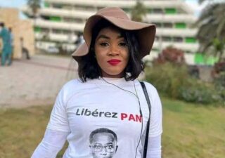 Senegalese journalist Maty Sarr Niang stands during a march for the release of journalist Pape Alé Niang. Photo provided by Souveibou Sagna.
