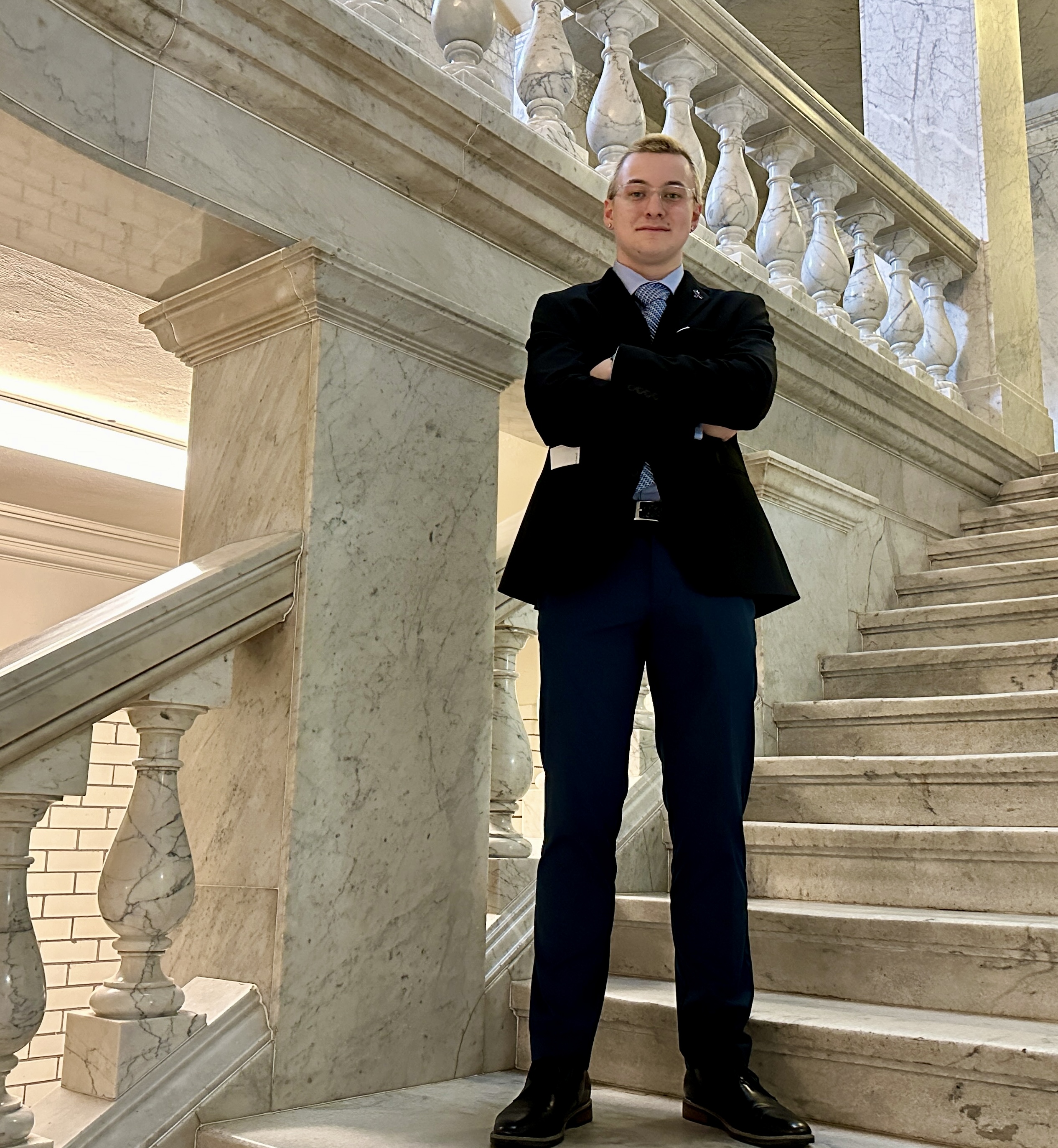 High school senior Jackson Taylor, who runs a student task force on drug and opioid issues in Montgomery County, stands inside the State Capitol in Annapolis on March 5, 2024. The 18-year-old is advocating for students to carry the overdose-reversing medication naloxone on school grounds. (Sapna Bansil/Capital News Service)