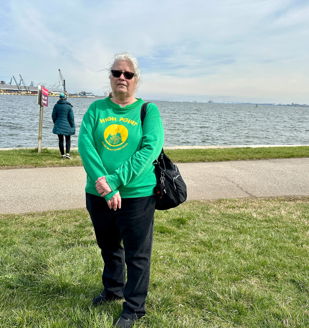 Mary Catherine Youngbar, a lifelong Brooklyn resident, visits Fort McHenry in Baltimore to view damage from the collapse of the Francis Scott Key Bridge on March 26. (Sapna Bansil/Capital News Service)